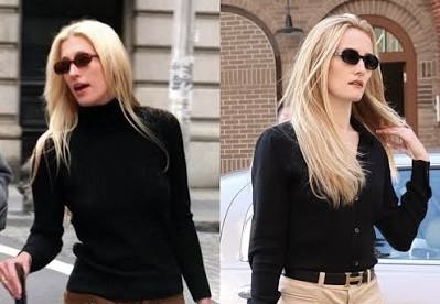 Carolyn Bessette-Kennedy in a dark blazer and flared trousers, from the essay
